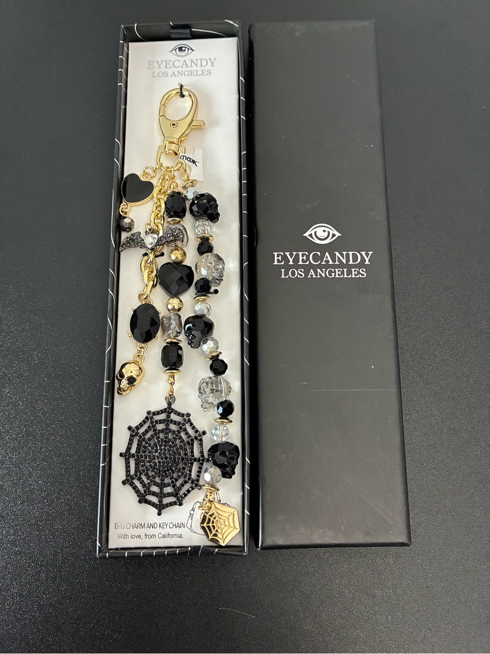 Eye Candy LA Halloween Black & Gold Beaded Spiderweb Bag Charm Keychain w Skulls
